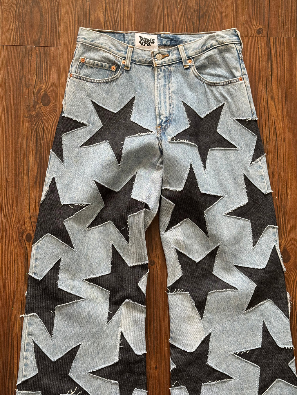 Light Washed All Over Star Jeans (Size 32)
