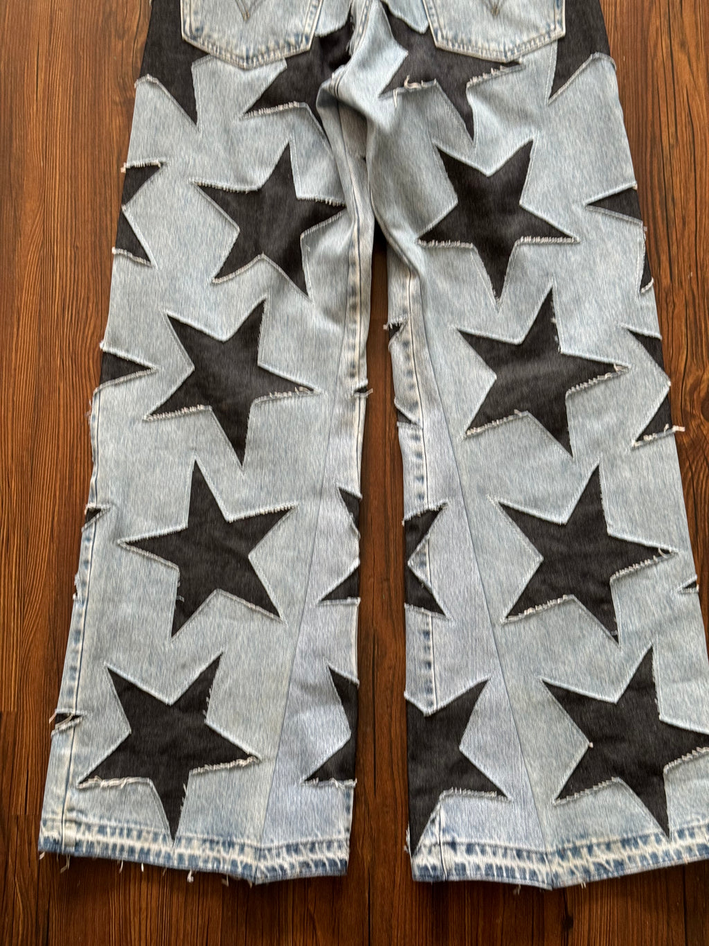 Light Washed All Over Star Jeans (Size 32)